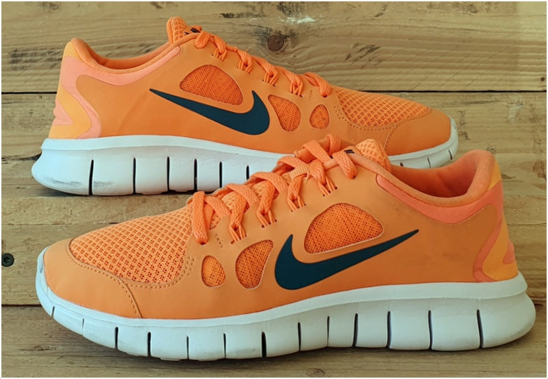 Nike free 5.0 white and orange best sale