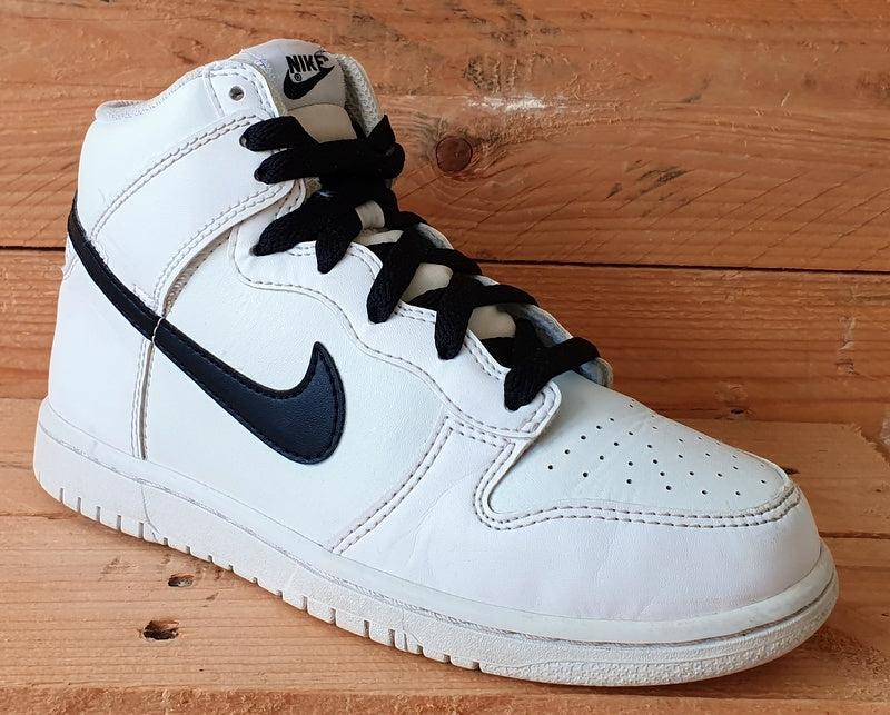 white and black nike high tops